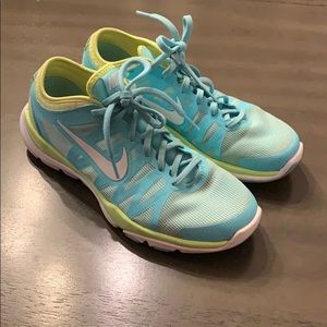 Women’s Nike running shoes, worn lightly